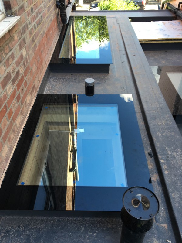 Multiple flat roof skylights on extension in Uxbridge